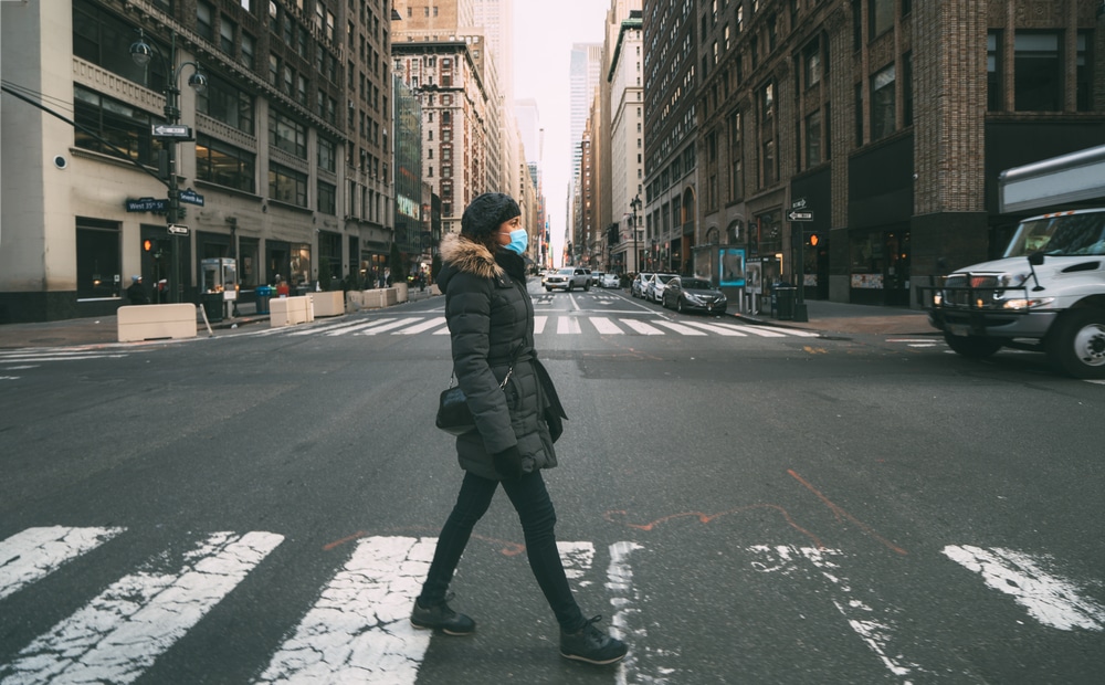 Girl walking on road